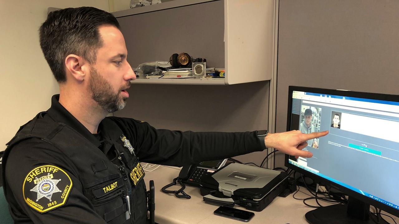 Washington County Sheriff's Office Deputy Jeff Talbot demonstrates how his agency uses facial recognition software. The department has used Rekognition since 2017. Picture: AP / Gillian Flaccus