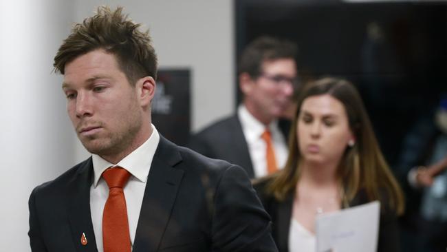 A dejected Toby Greene walks from the hearing at the AFL tribunal on Tuesday night. Picture: Getty Images