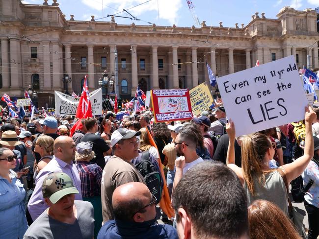 Anti government protesters gather in Bourke St before they march around the CBD. Picture: Ian Currie