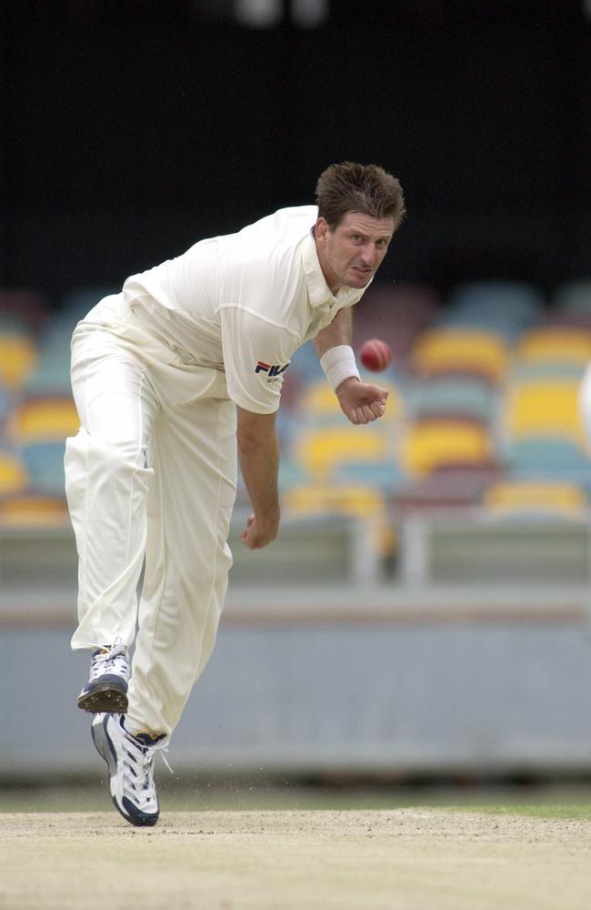 Michael Kasprowicz bowling. Bulls V Blues Pura Cup Match at the Gabba. Picture: Darren England.