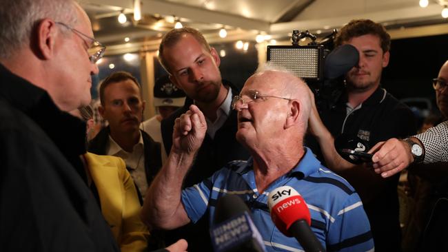 DAILY TELEGRAPH, APRIL 06, 2022: A man yells about the pension for a good 5min to the Prime minister Scott Morrison as he visits the Edgeworth Tavern  in Edgeworth, Newcastle.Picture: Damian Shaw