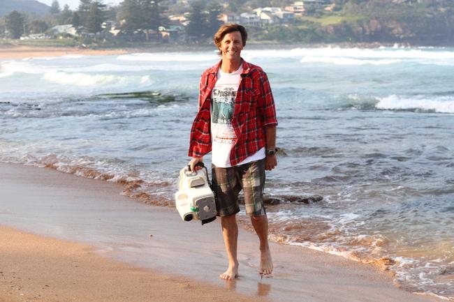 Tim Bonython pictured at Avalon Beach is an award-winner cinematographer who's spent five years making<span id="U321144523395H5H" style="font-weight:normal;font-style:italic;"> The Big Wave Project</span>, a surfing movie which will be released and taken on tour around Australia from next week. Picture: Renee Nowytarger.