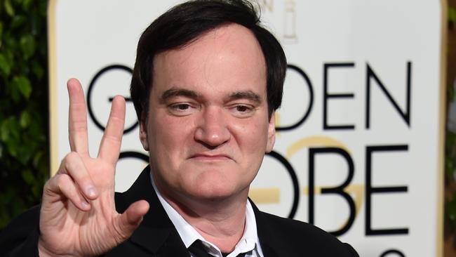 Gesturing ... We’re not entirely sure what The Hateful Eight director Quentin Tarantino is trying to say here. Picture: AFP/ Valerie Macon