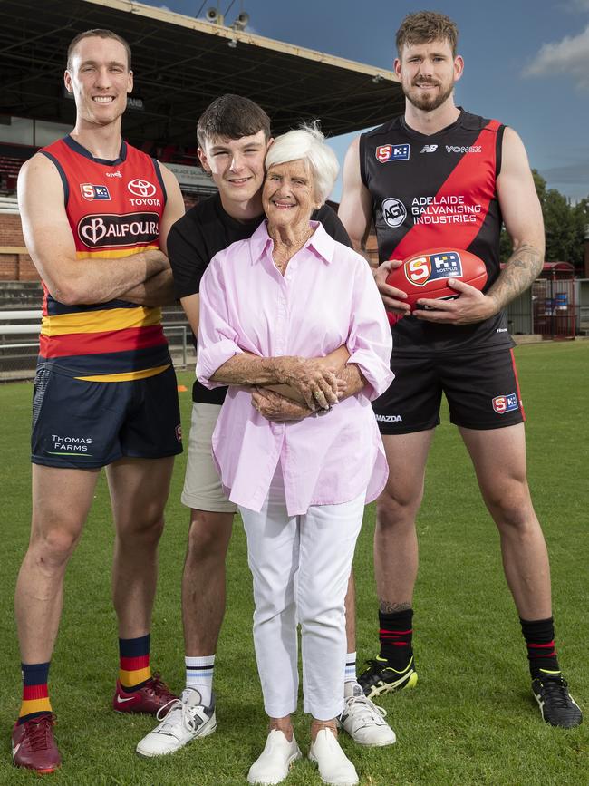 Barb Kerley with grandson Campbell Hossack and players, Jack Madgen of the Adelaide Crows and Kaiden Brand from West Adelaide, at Richmond Oval. Picture: Sarah Reed