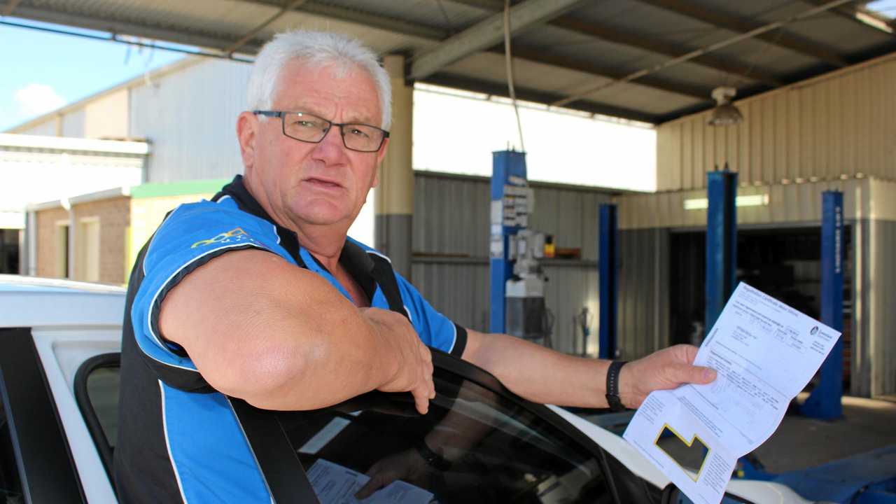RIDICULOUS: B&K Motors owner Dave Kemp pays registration on about 12 different vehicles. With fees increasing every year, it's a strain on his local business. Picture: Marian Faa