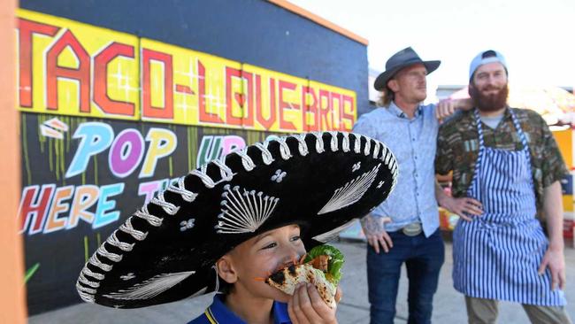 POP UP TACOS: Jayden Morris, 9, enjoys a taco at the pop-up Taco Love Bros shop in Lismore where proprietors Jordan and Dylan Morris are providing pop-up tacos for Lismore. Picture: Marc Stapelberg