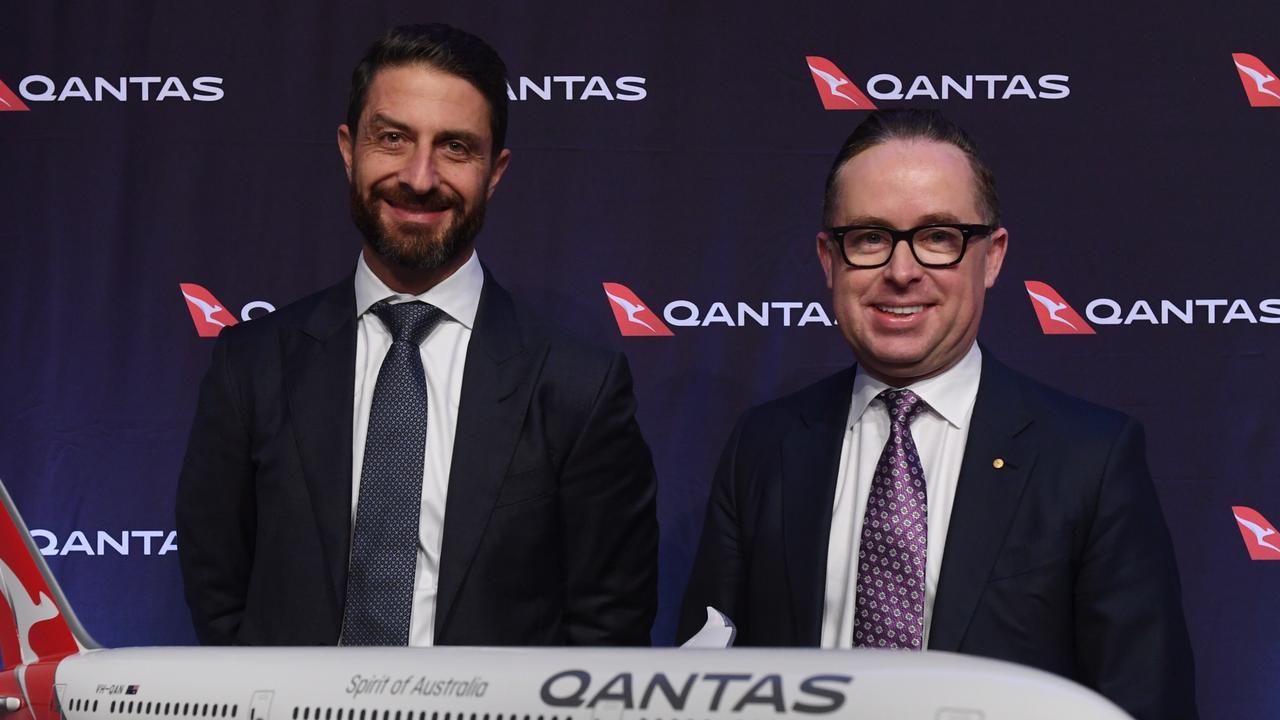 Qantas group chief executive Alan Joyce with Tino La Spina (left). Picture: Dean Lewins/AAP