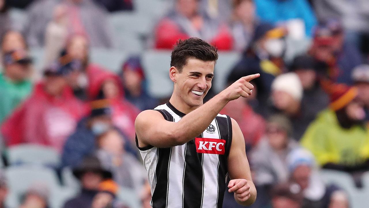 ADELAIDE, AUSTRALIA - JULY 16: Nick Daicos of the Magpies celebrates a goal during the 2022 AFL Round 18 match between the Adelaide Crows and the Collingwood Magpies at the Adelaide Oval on July 16, 2022 in Adelaide, Australia. (Photo by Sarah Reed/AFL Photos via Getty Images)