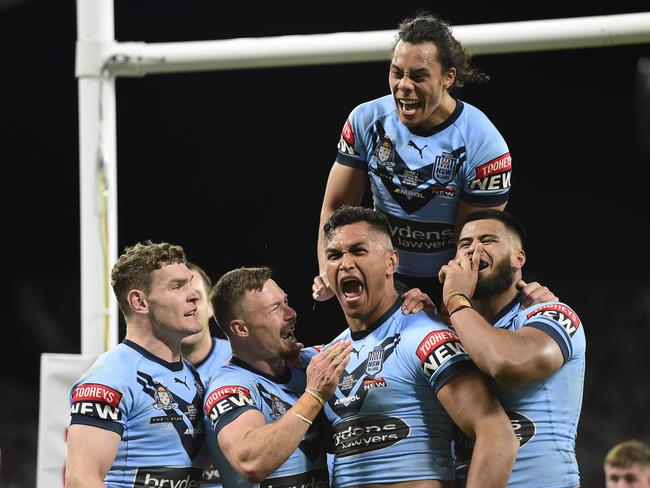 NSW celebrate during their big win over Queensland. Picture: Getty Images