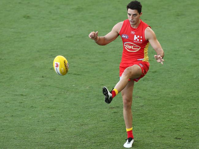 Brayden Fiorini of the Suns kicks during the AFL pre-season practice match between the Gold Coast Suns and the Brisbane Lions at Metricon Stadium on February 23, 2019 in Gold Coast, Australia. Picture: Chris Hyde/Getty Images.