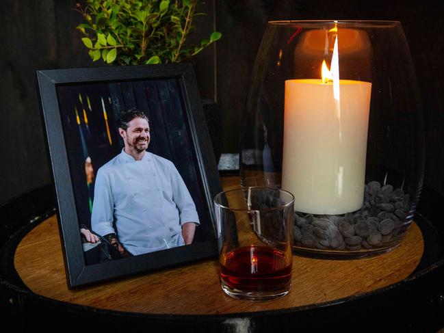 A candle, portrait and a whiskey was a memorial tribute to Jock Zonfrillo at Tasting Australia’s secret whisky bar, Mr Whiskers. Picture: NCA NewsWire/Emma Brasier