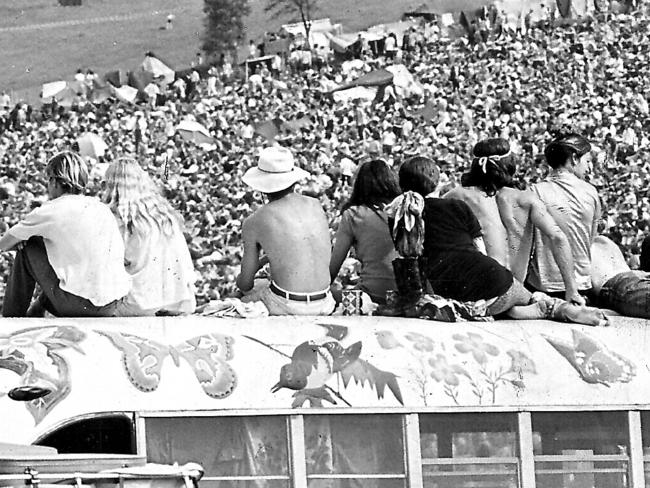 Crowd at 1969 Woodstock rock music festival at farm of Max Yasgur at Bethel, New York, USA.1960s  hippies/Crowds/Popular/music/Youth