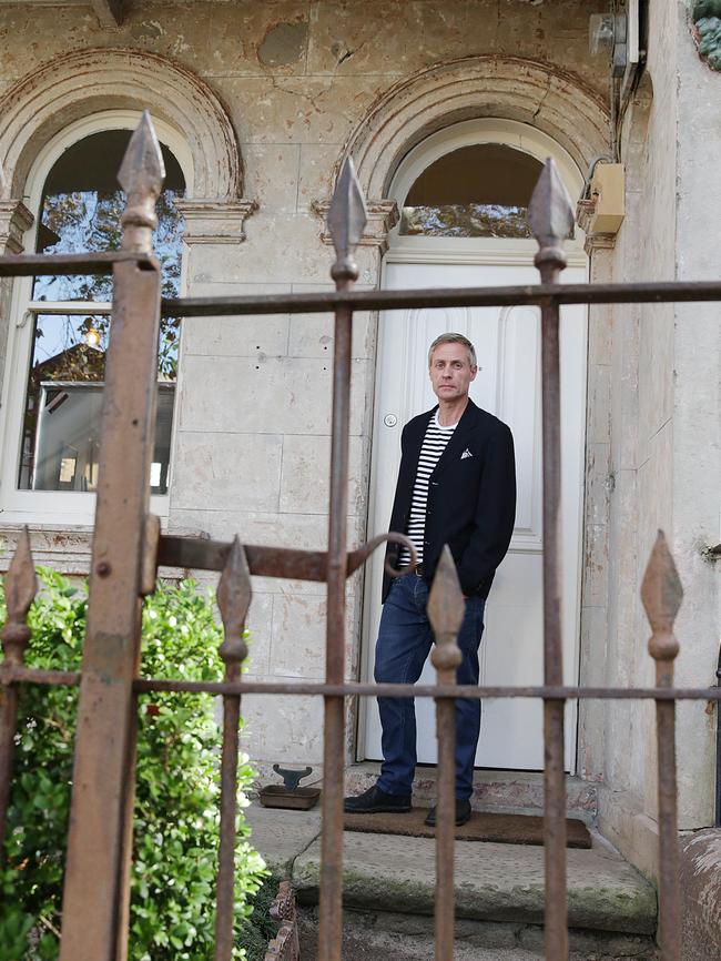 Mr Fitzgerald on the front porch of the home. Picture: Daniel Aarons.