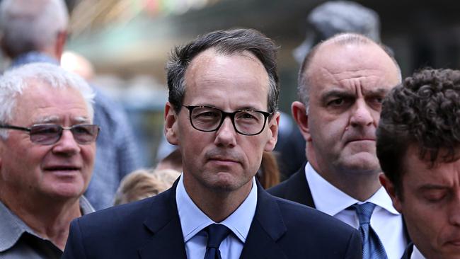 ASIC chairman James Shipton (centre) arrives at the Royal Commission into Misconduct in the Banking, Superannuation and Financial Services Industry in Sydney earlier today. Picture: AAP