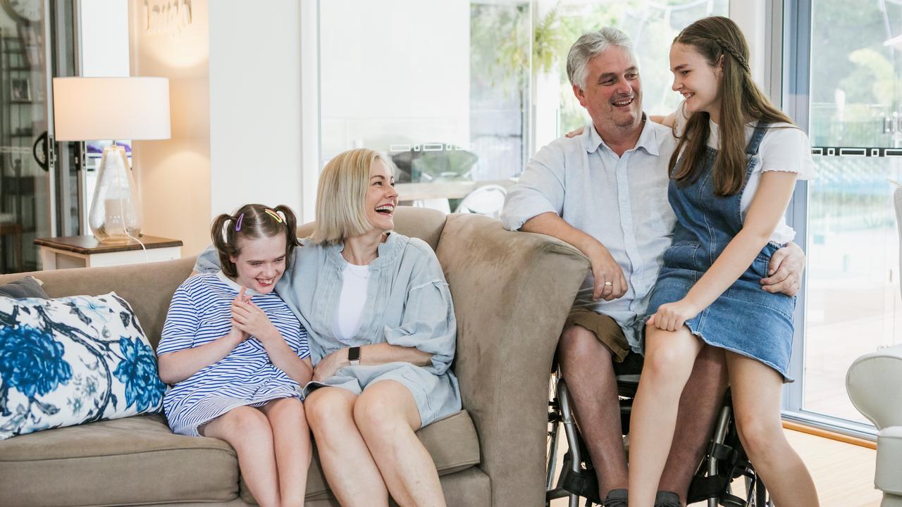 'I don't have time to blink to be honest': Cameron Toomey with wife, Shelley and twin daughters Abbey and Lucy.