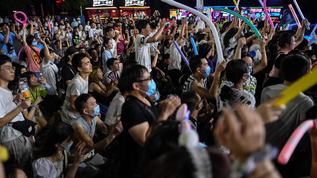 Meanwhile in Wuhan — source of the coronavirus crisis — on August 4 locals crowded for a music festival — a far cry from the terrified crowds who queued at hospitals in the first weeks after a lockdown was imposed in late January. Picture: AFP