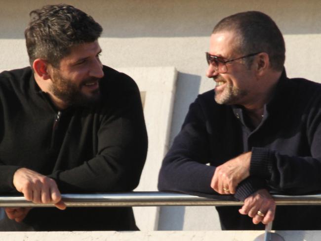 George Michael and Fadi Fawaz during happier times. Picture: Splash