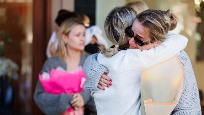 Floral tributes and condolences from members of the public outside Westfield Bondi Junction this morning after the massacre on the weekend. Picture: NCA NewsWire / David Swift