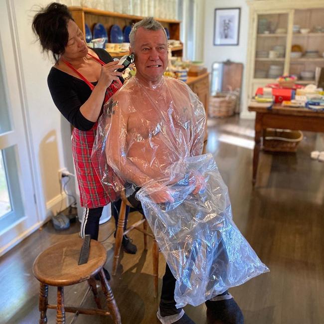 Jane Barnes cuts hubby Jimmy’s hair at their Southern Highlands retreat. Picture: Instagram