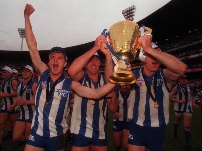 Laidley and Roos teammates savour victory after the 1996 Grand Final.