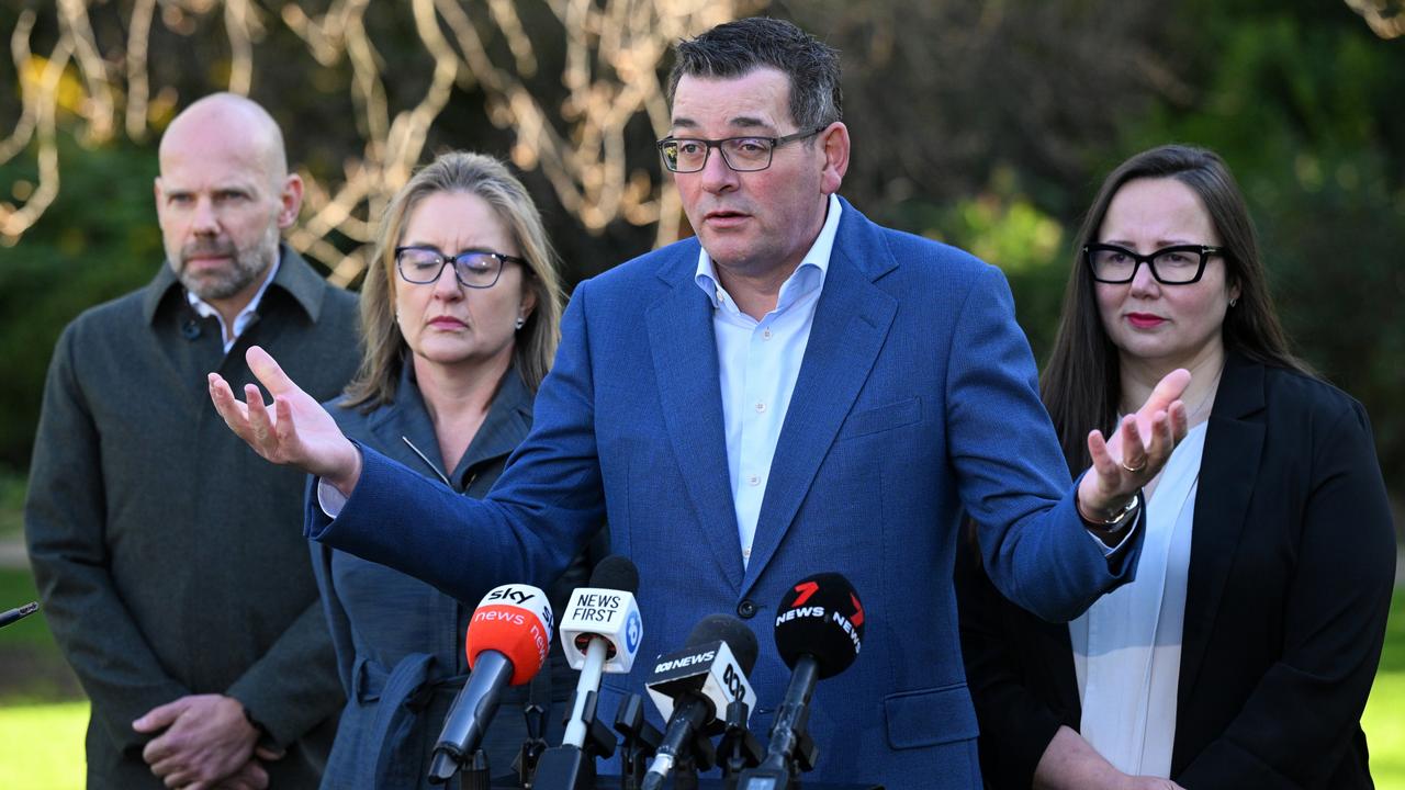 Jeroen Weimar (left) joined Victorian Premier Daniel Andrews as he revealed he had cancelled the Games. Picture: AAP Image/James Ross