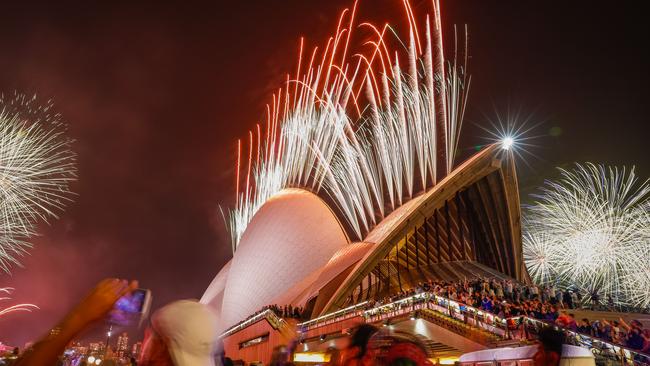 VARIOUS CITIES, AUSTRALIA - JANUARY 01: Fireworks explode over the Sydney Harbour Bridge and Sydney Opera House during the midnight display during New Year's Eve celebrations on January 01, 2020 in Sydney, Australia. (Photo by Hanna Lassen/Getty Images)