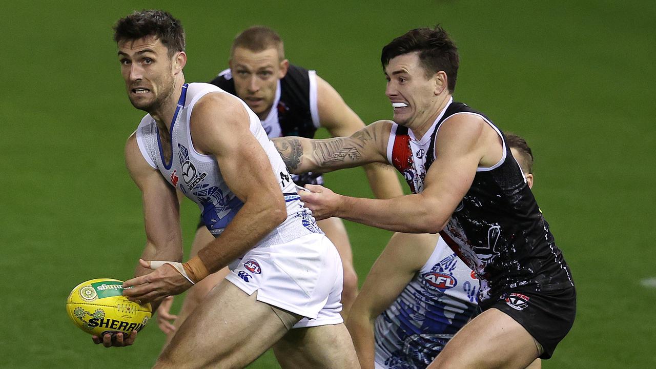 AFL Round 11. St Kilda vs North Melbourne at Marvel Stadium, Melbourne. 29/05/2021 . Tom Campbell of the Kangaroos looks to clear during the 3rd qtr. . Pic: Michael Klein