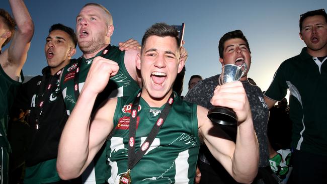 Airport West celebrates its EDFL Division 1 premiership triumph. Picture: Mark Dadswell