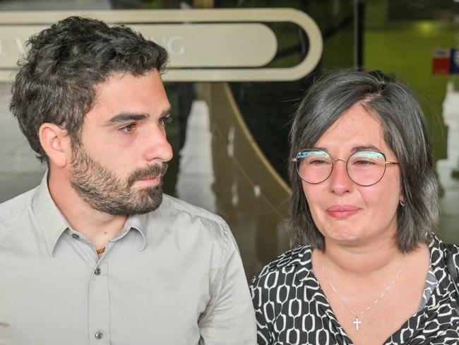 ADELAIDE, AUSTRALIA - NewsWire Photos  NOVEMBER 22, 2024: Italian travel blogger Gabriele Cairo, who caused the death of three members of the same family in a horror triple fatal car crash, leaves the Adelaide Magistrates Court with his wife Elena Perrone. Picture: Newswire / Brenton Edwards