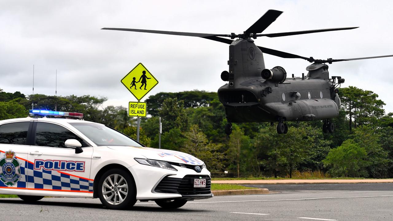 A Singapore Air Force CH-47F Chinook Helicopter landing outside Ingham State High School. Picture: Cameron Bates