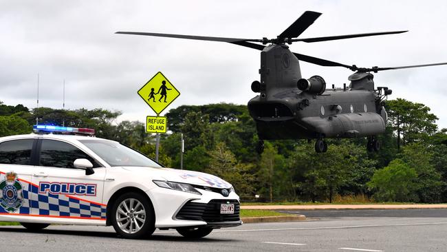 A Singapore Air Force CH-47F Chinook Helicopter landing outside Ingham State High School. Picture: Cameron Bates