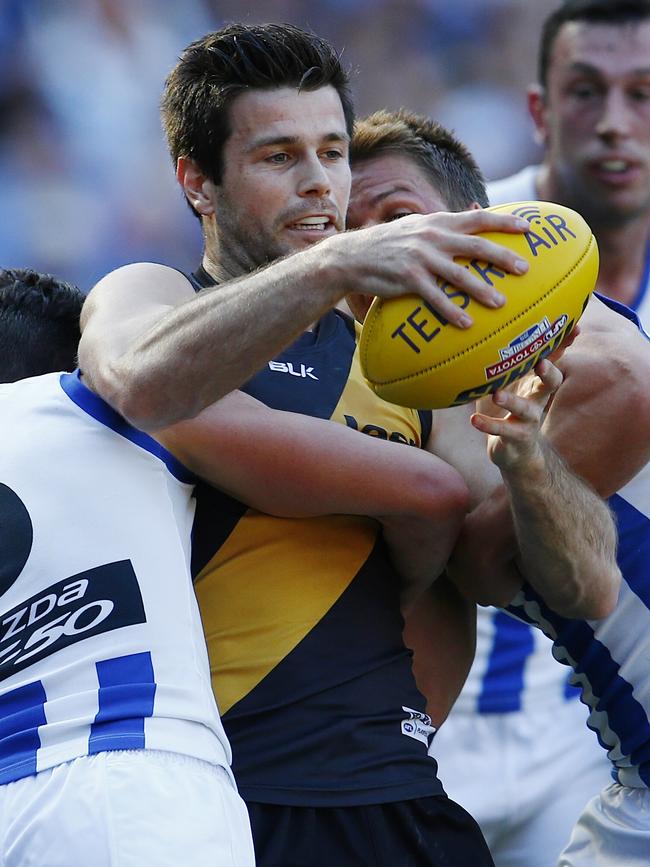 Trent Cotchin under siege in the 2015 elimination final. Picture: Michael Klein