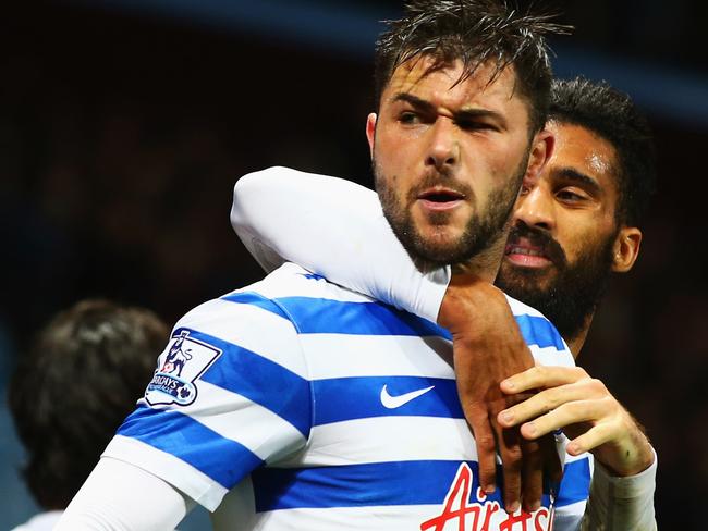 BIRMINGHAM, ENGLAND - APRIL 07: Charlie Austin of QPR (front) celebrates with Armand Traore as he scores their third goal during the Barclays Premier League match between Aston Villa and Queens Park Rangers at Villa Park on April 7, 2015 in Birmingham, England. (Photo by Matthew Lewis/Getty Images)