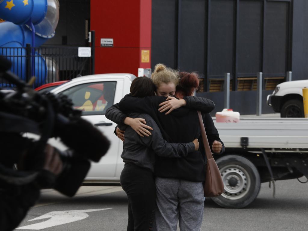 Friends cried and hugged each other as they arrived at the site. Picture: Robert Lang