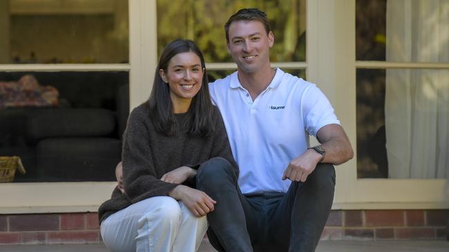 Former Adelaide Crow Daniel Talia with wife Megan at their new home in Unley. Picture: Roy VanDerVegt