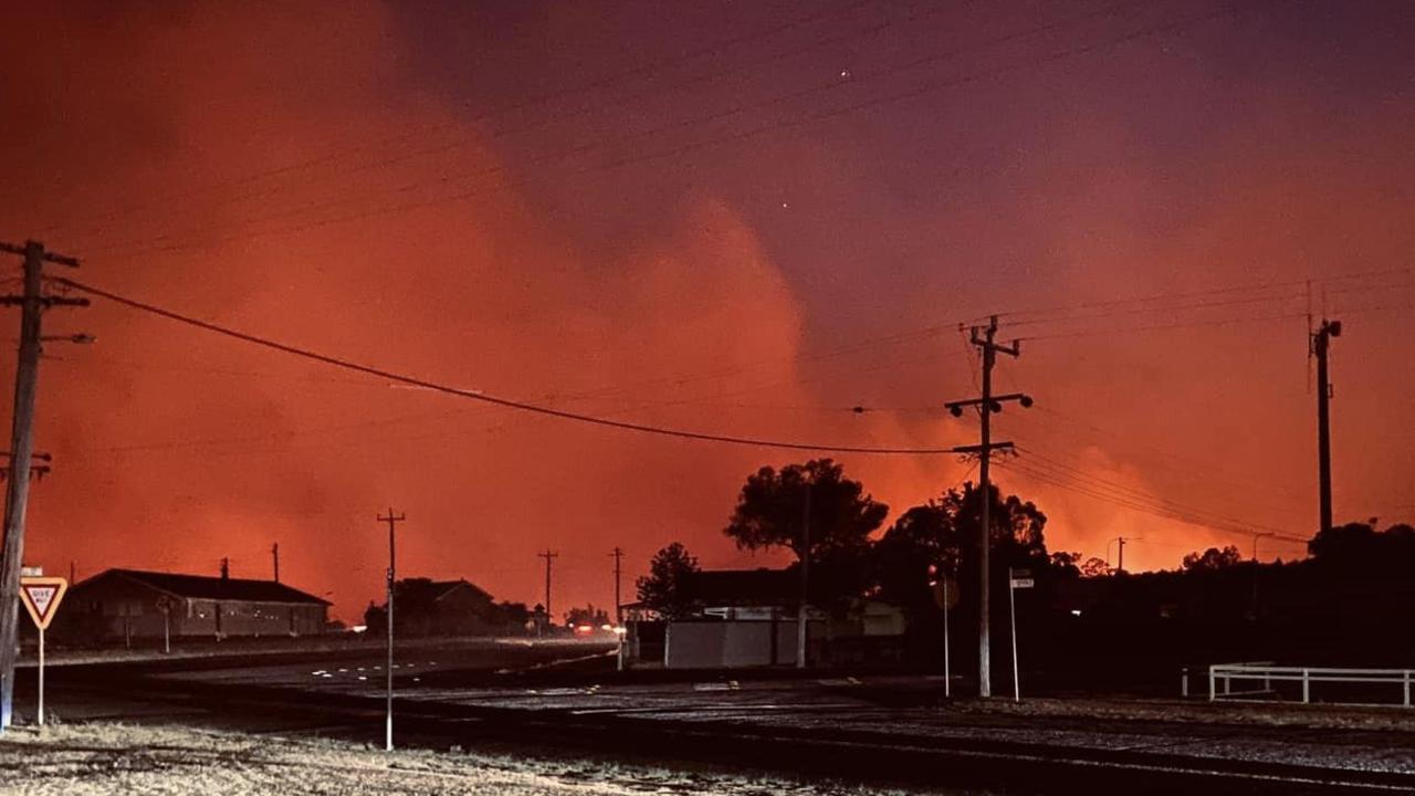 The haunting glow as bushfires raged into the night near Wallangarra.