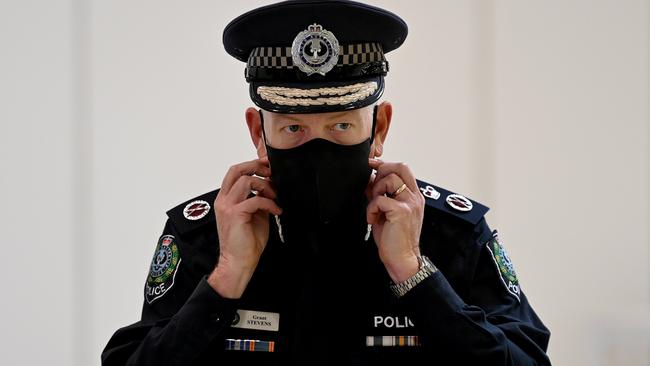 Police commissioner Grant Stevens dons his mask after a press conference. Picture: NCA NewsWire / Naomi Jellicoe