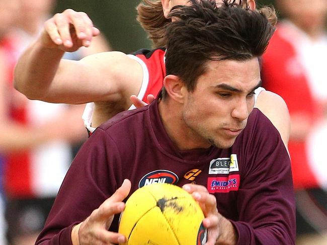 Jacob Mitchell of Banyule marks in front of Benjamin McKenzie of Watsonia during NFL footy: Watsonia v Banyule on Saturday, May 12, 2018, in Watsonia, Victoria, Australia. Picture: Hamish Blair