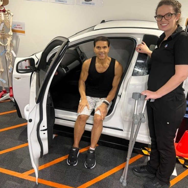 Joint surgery patient Terry Martinesz, with occupational therapist Matilda Freeman, who is helping him use the 