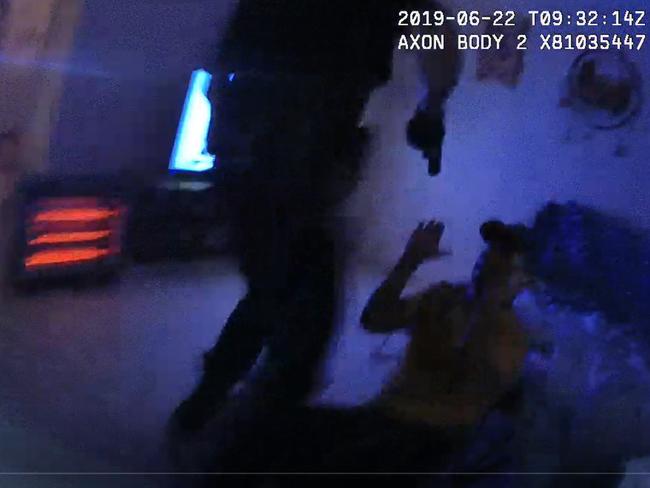 A still of body-worn camera footage of Zach Rolfe arresting Kumanjayi Walker in Alice Springs in 2019.