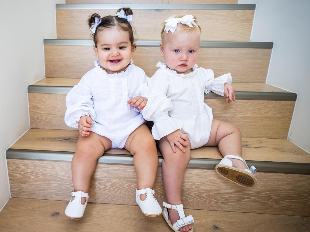 Babies Gigi Manzueto and Sierra Garuccio will have to deal with national debt increases when they’re older. Picture: Tom Huntley