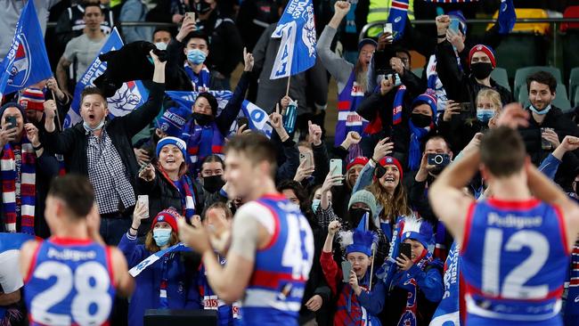 Bulldogs players clap their fans after their preliminary final win at Adelaide Oval.