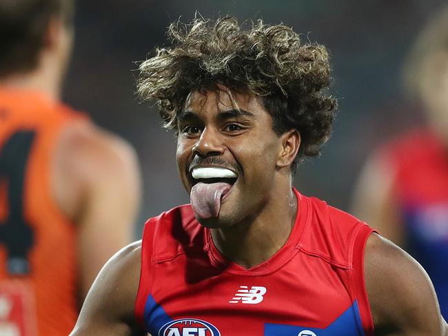 CANBERRA, AUSTRALIA - APRIL 04: Kysaiah Pickett of the Demons celebrates kicking a goal during the round 3 AFL match between the GWS Giants and the Melbourne Demons at Manuka Oval on April 04, 2021 in Canberra, Australia. (Photo by Mark Metcalfe/AFL Photos/via Getty Images)