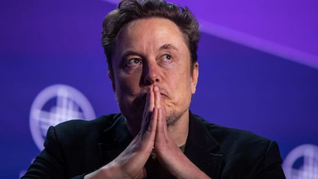 The cost of re-evaluating Elon Musk’s pay package could surpass $25 billion. PHOTO: APU GOMES/GETTY IMAGES