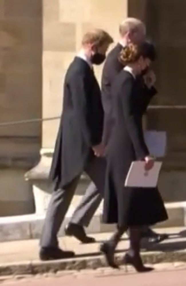 Kate Middleton, Prince Harry and Prince William walking together after the funeral service for Prince Philip. Picture: 7 NEWS