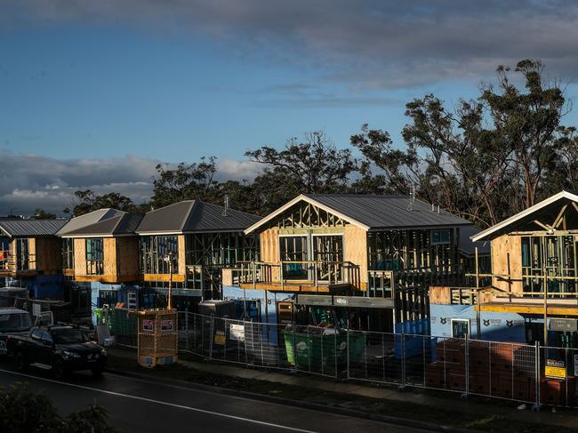 LAKE MACQUARIE, AUSTRALIA - MAY 08: New housing is shown under construction at Cameron Park on May 08, 2024 in Lake Macquarie, Australia. Australia's Labor government is grappling with a slowing economy, weaker commodity prices, soaring housing costs and a softening labor market as it prepares to unveil its federal budget on May 14. To counter these headwinds, the budget is expected to feature smaller revenue upgrades compared to recent years, while outlining the government's interventionist policies aimed at boosting domestic manufacturing and the transition to green energy. Critics warn that such industrial policies risk fueling inflation and diverting resources from more productive sectors of the economy. (Photo by Roni Bintang/Getty Images)