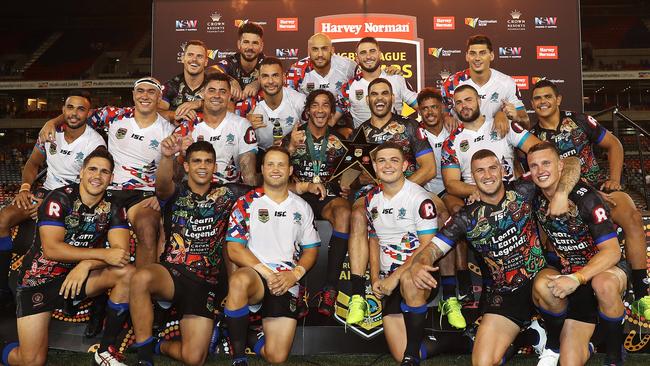 The Indigenous All Stars celebrate victory after the Indigenous All Stars v NRL World All Stars game. Picture: Brett Costello