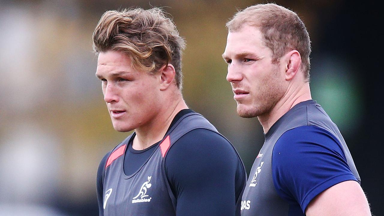 Michael Hooper talks to David Pocock of the Wallabies during a training session.