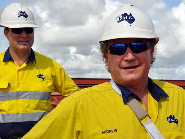 Fortescue Metals Group's CEO Andrew Forrest (right) celebrates the first ore from their joint venture with BC Iron as it is loaded to a ship in Port Hedland WA, Thursday, Feb. 24, 2011. About 20,000 tonnes of ore was loaded onto the China-bound ship. (AAP Image/Josh Jerga) NO ARCHIVING