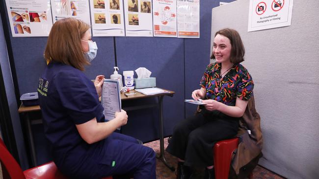 Student Holly Horne 16 in year 11 at Elizabeth College is given her first Pfizer vaccination by Anne-Maree Kroon authorised nurse immuniser. COVID vaccinations for students at Elizabeth College in Hobart. Picture: Nikki Davis-Jones